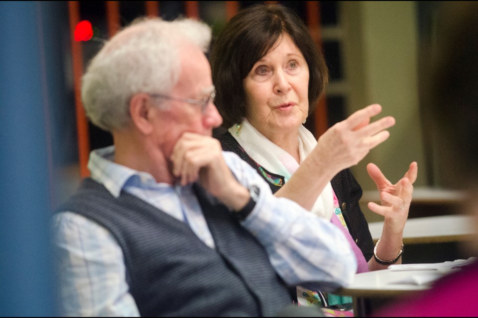 Community members share their views at a dementia-awareness event organized by New Westminster students recently.