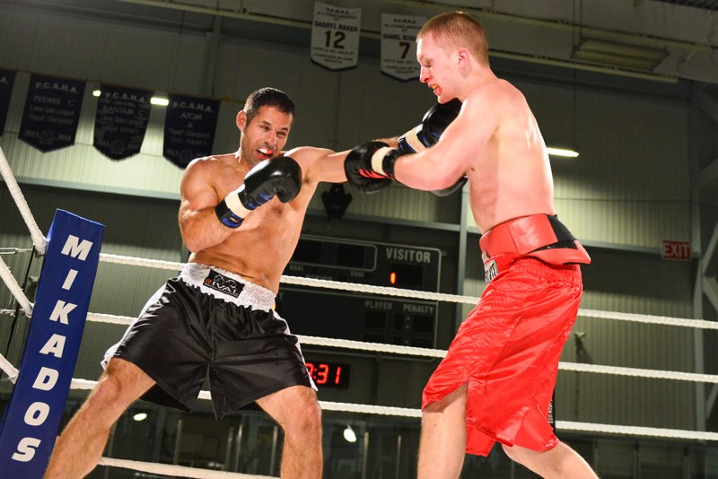 Gibsons’ George Vourtsis and Parksville’s Brandon Busby put on a great show in the main event of War on the Shore 3, hosted by the Sunshine Coast Boxing Club on Saturday, April 25 at the Gibsons and Area Community Centre. See more photos at www.coastreporter.net