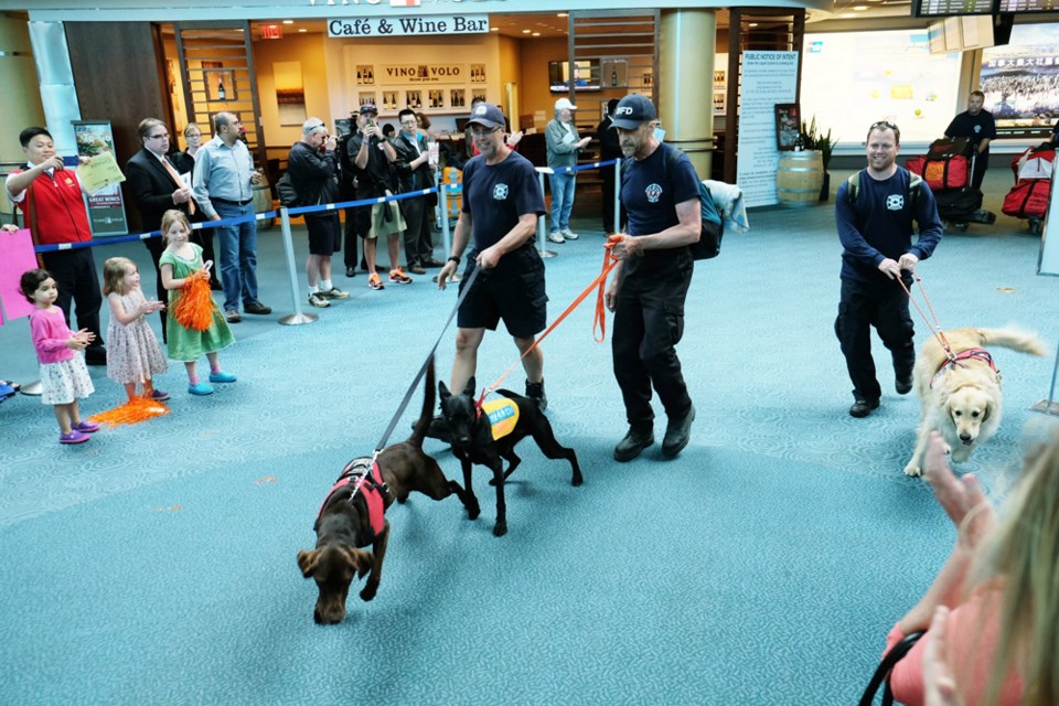 Burnaby firefighters returned to Vancouver Monday after six days helping with recovery efforts following the deadly earthquake in Nepal.