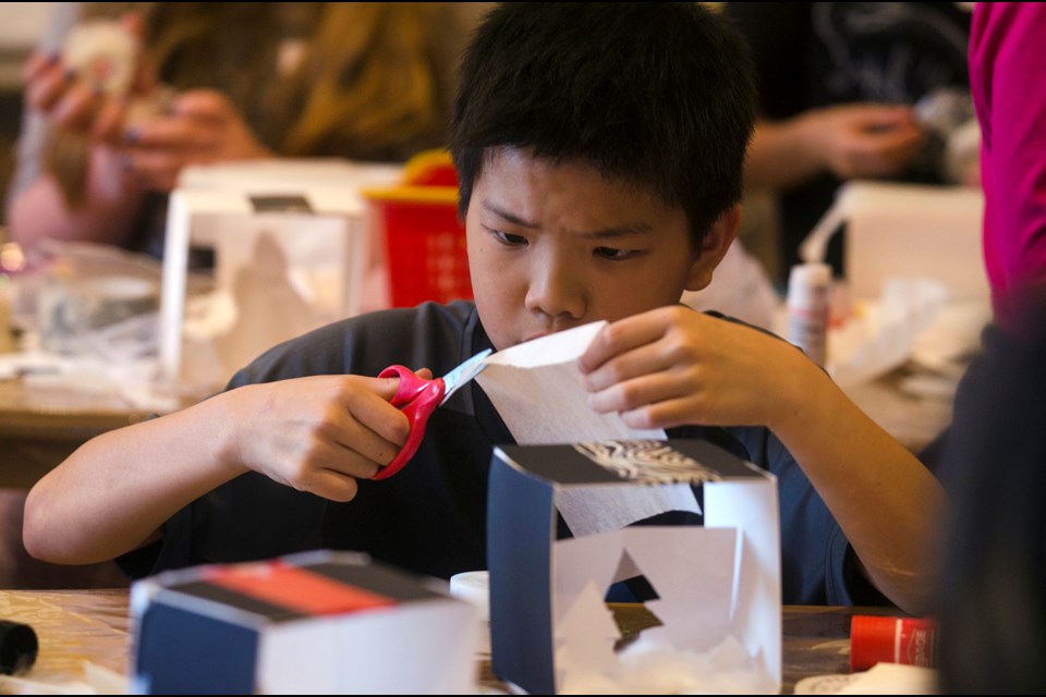 Seaforth Elementary student Cliff Yang works on a light sculpture during a field trip to the Burnaby Art Gallery recently.