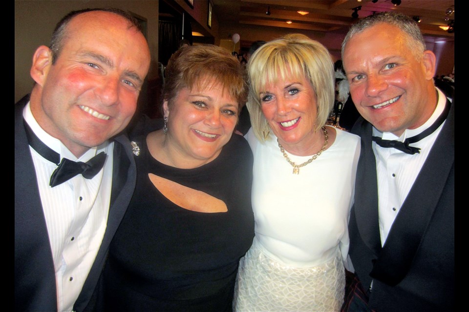 Richmond firefighters Jim Dickson, left, and Jack Beestra flanked Richmond Rotary gala chair Melinda Newman and president Debbie Murphy. The firefighter’s dinner fetched nearly $8,000 and contributed to the $100,000 raised for local charities. Since 1988, more than $1 million has been raised from the annual spring gala.