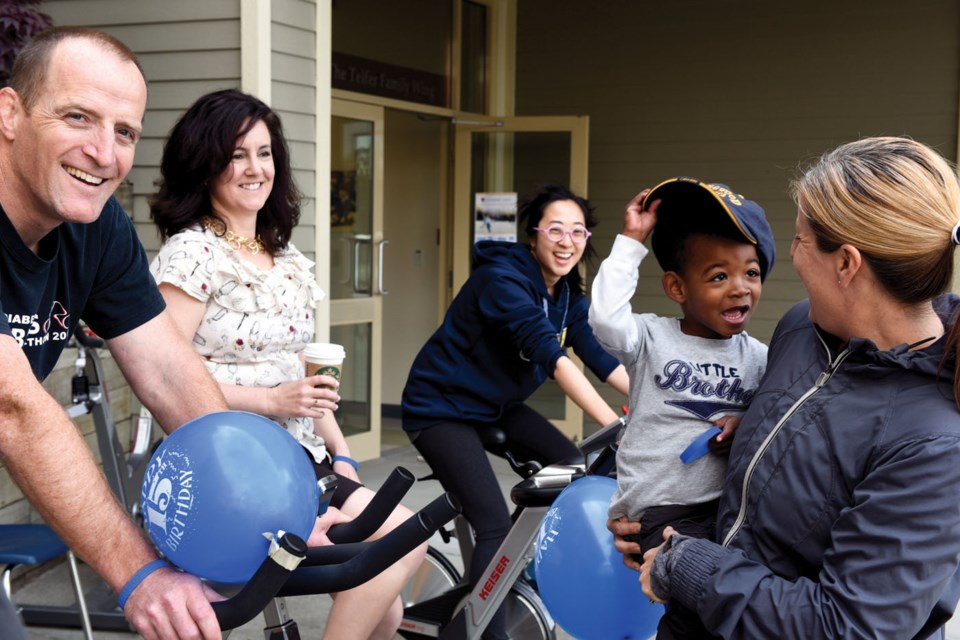 Head of Collingwood School’s Wentworth Campus Ian Kennedy, left, spins on a stationary bike with the school’s faculty and staff during the JDRF Spin-a-thon at Collingwood School in West Vancouver on May 14. Teams of students, faculty, staff and parents spun on stationary bikes from 8 a.m. to 5 p.m. and raised more than $20,000 for juvenile diabetes research. PHOTO SUPPLIED LESLIE FRASER