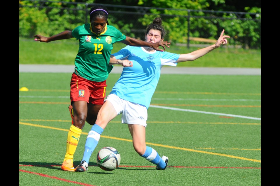 Cameroon arrived in Vancouver on May 15 in advance of the FIFA World Cup, which begins June 6 when Canada plays China at Commonwealth Stadium in Edmonton. Les Lionnes played the first of two test-matches against the North Shore Girls Soccer Club at Windsor Turf Field on May 17.Cameroon was the first of 24 teams to arrive in Canada for the World Cup, landing at YVR May 15, 2015 before taking to the pitch against the North Shore Renegades. Photo Cindy Goodman