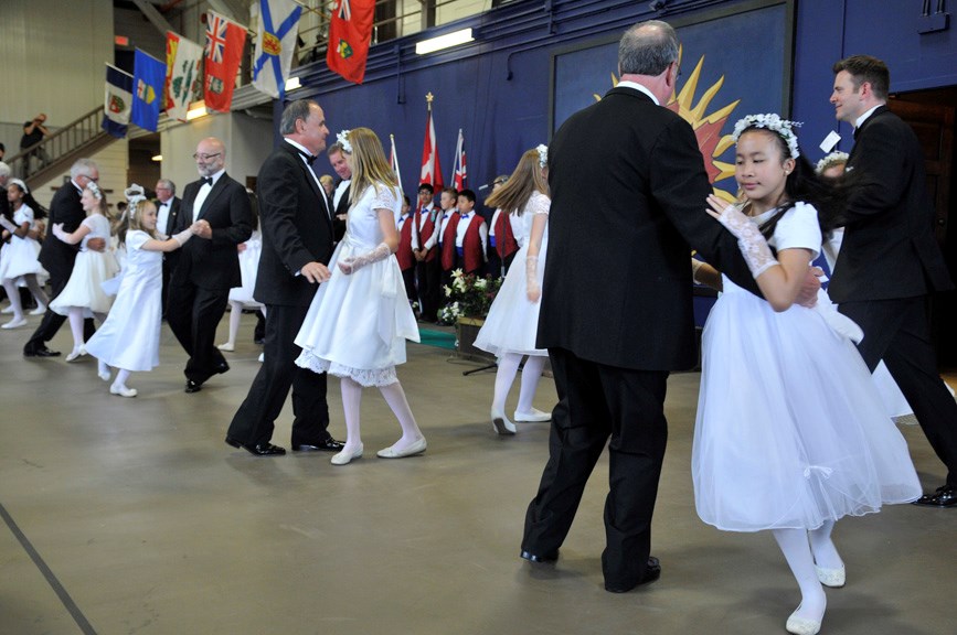 A tradition continues: Royal Lancers and members of the 2014 and 2015 May Queen suites danced their traditional quadrille dances at the inaugural community heritage picnic at the Royal Westminster Regiment Armoury on Sunday.