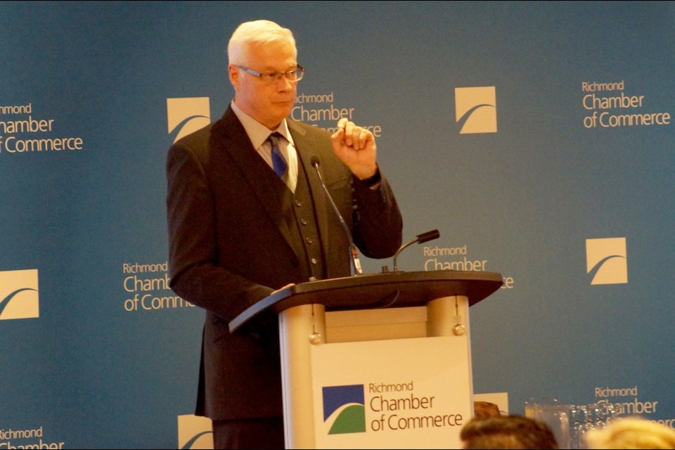 YVR CEO Craig Richmond talks about the airport's five-year plan at a Richmond Chamber of Commerce. luncheon on May 29, 2015.