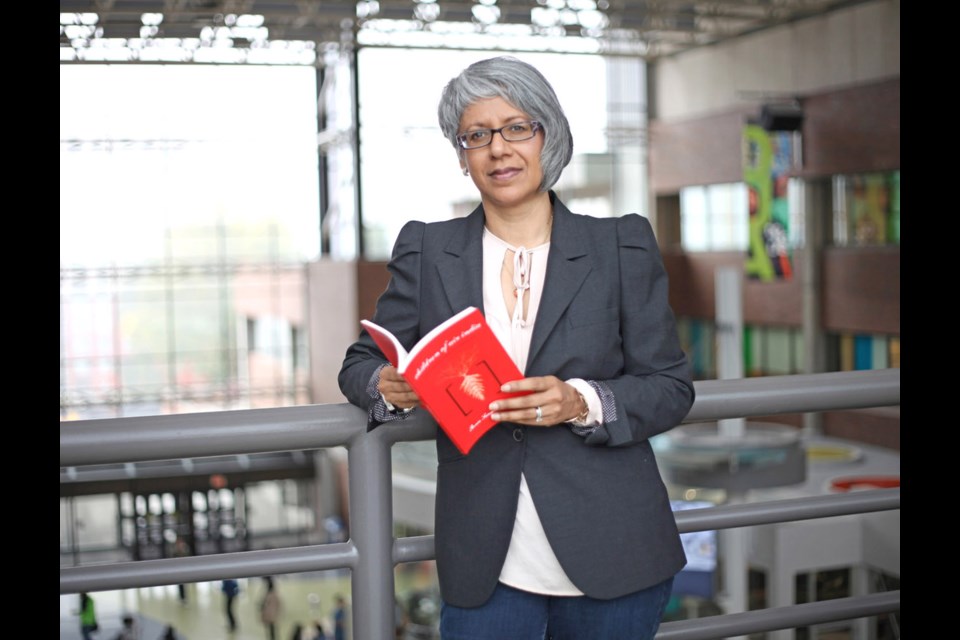 Poet Renee Saklikar with her book, Children of Air India: Un/Authorized Exhibits and Interjections. She joined forces with composer John Oliver for a work that's debuting this week.