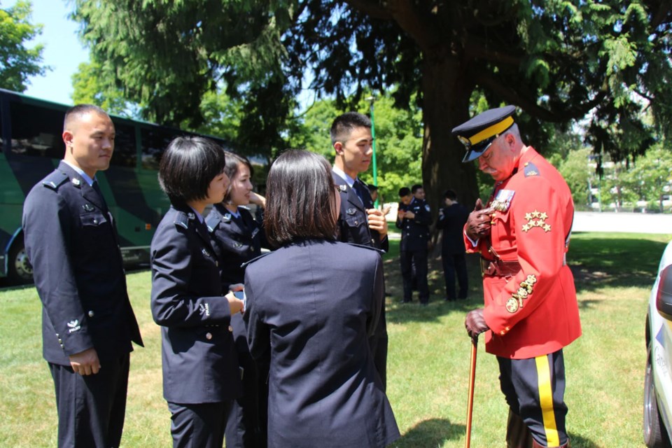 Burnaby RCMP Staff Sgt. Maj. John Buis met with 33 police cadets from the People’s Public Security University of Beijing who were in the Lower Mainland for two weeks as part of the Justice Institute of B.C.’s international program.