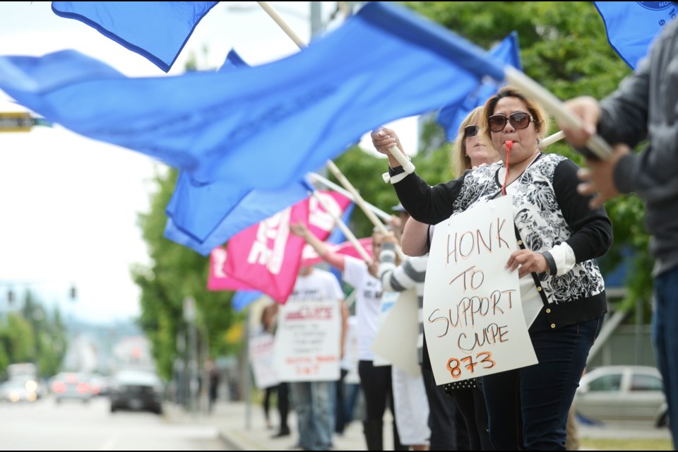 SN Transport Ltd. employees, along with CUPE and HEU supporters, take to the picket lines at RCH Wednesday.