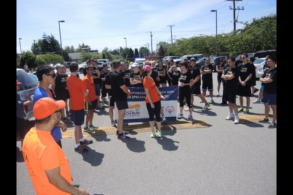 2015 Law Enforcement Torch run participants get set to depart the parking of the Cornerstone Christian Church on No. 5 and Blundell roads