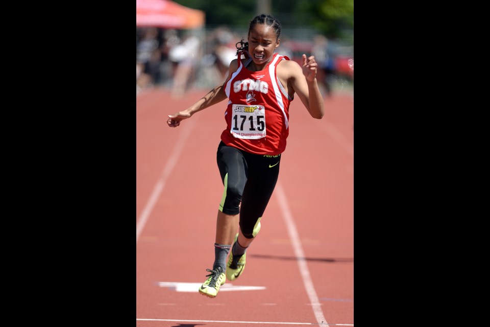 06-05-15
1715 Zion Corrales Nelson of St. Thomas More in the Womens 100m dash senior
2015 BC High School Track and Field Championships in Langley.
Photo: Jennifer Gauthier