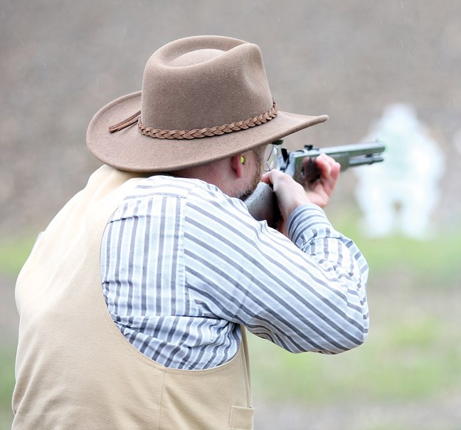 Eddie Blackwater takes aim and fires his rifle at the Prince George Rod and Gun Club. This past Saturday was the second annual match of the club's Cowboy Action Shooting contest.