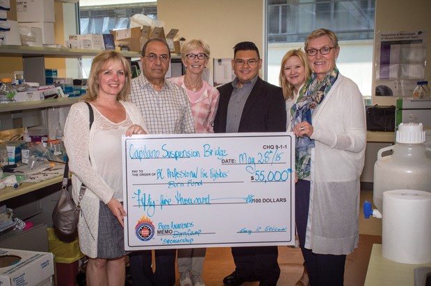 Representatives from Capilano Suspension Bridge Park donate $55,000 to the B.C. Professional Fire Fighters’ Burn Fund. The money will help the fund deliver the annual Burn Awareness Week and Burn Camp for young survivors.