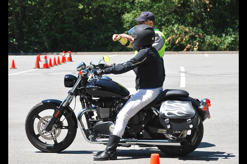 About 150 people took part in the inaugural Burnaby RCMP motorcycle safety skills challenge in South Burnaby on June 27. The free event was open to anyone. Participants navigated a recertification course based on the RCMP’s motorcycle training program, and officers were on hand to answer any safety courses.