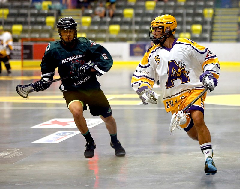 Coquitlam Jr. Adanac Tyler Vogrig carries the ball during a 16-5 win over the Burnaby Lakers.