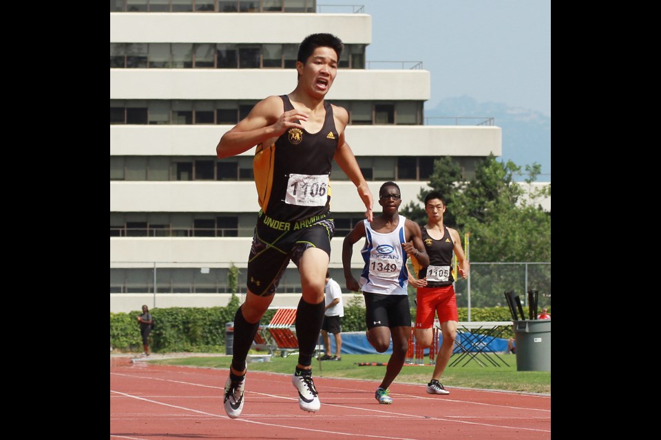 July 7/15
Trevor Craven Memorial Meet - Nathan Mah (#1106) races in the junior 200m final.
ROB KRUYT PHOTO