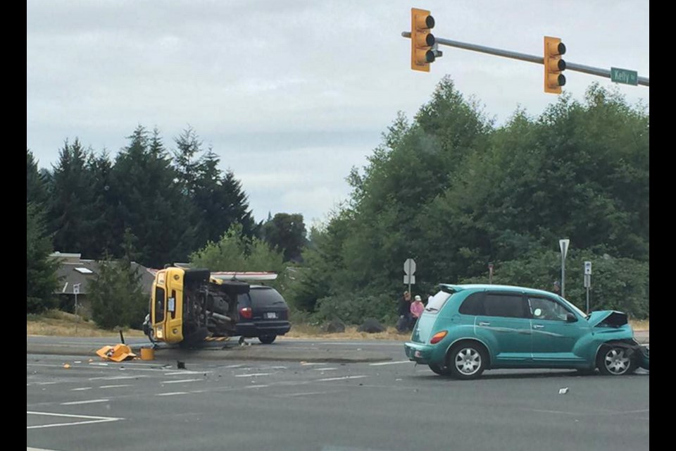 Two people were injured Sunday morning when a Chrysler PT Cruiser and Ford Ranger collided at Veterans Memorial Parkway and Kelly Road. The impact caused the truck roll over, take out a traffic light and land on its side.