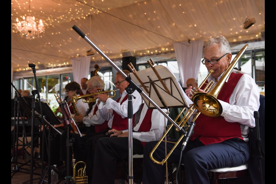 The Brock House Jazz Band, under the direction of Doug Rogerson, entertained Summer Fair goers this past Saturday at Brock House. The Brock House Big Band and Orchestra also provided entertainment for the annual party which is a major fundraiser for the seniors activity centre on Point Grey Road. Photograph by: Rebecca Blissett