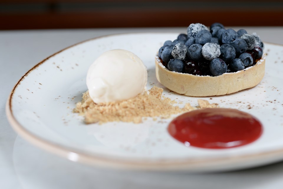 YEW Seafood + Bar’s fresh blueberry tart. Photo Jennifer Gauthier