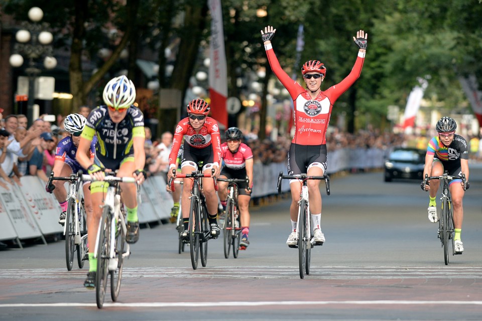 After breaking out on her own and catching up with the back of the pack, Trek Red Truck cyclist Denise Ramsden crosses the finish line to win the Gastown Grand Prix on July 15, 2015. Photo Jennifer Gauthier