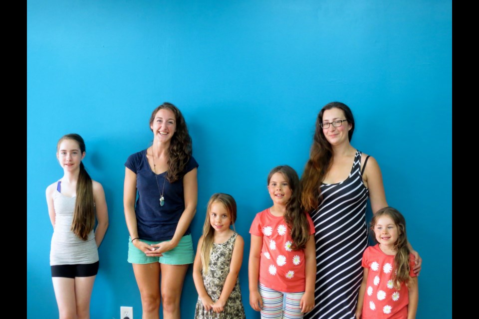 Before: From left, Vienna McKenzie, Mrs. Jessica, Kailey Carson, Miranda Malcolm, Amanda Semenoff and Miriam Malcolm from Kids in Motion Dance Studio in Sapperton before cutting their for hair for B.C. Children's Hospital's Wigs for Kids program. The event was organized by five-year-old ballet student Kailey Carson.
