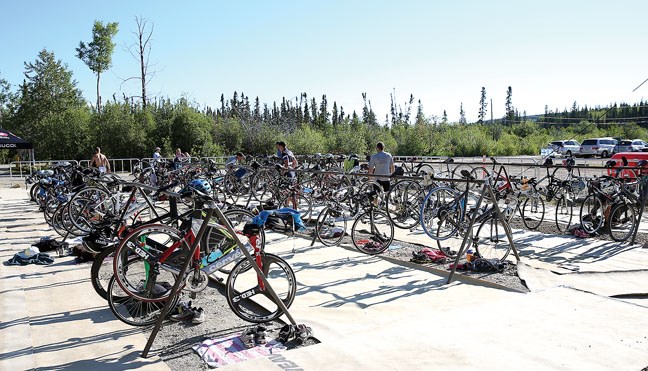 Bikes fill the transition area where athletes competing in the Pomeroy Inn and Suites Prince George Triathlon will go from the swimming portion of the contest to the biking portion. The triathlon took place Sunday, under sunny skies, out at West Lake.