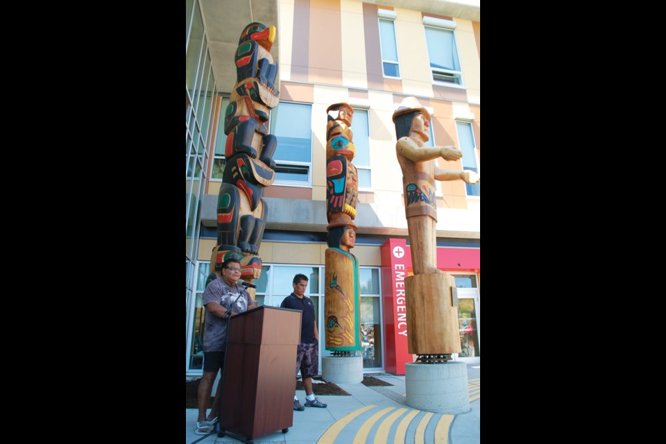 Sechelt Nation carvers Tony Paul and Dion Louie. See more photos in our online galleries at www.coastreporter.net