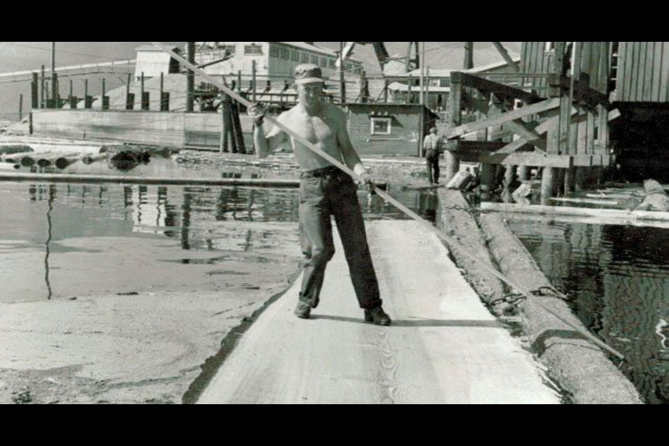 Boom man Jim Daly at B.C. Forest Products at Youbou in 1965, part of the Wilmer Gold photo collection. The Cowichan Lake Community Forest Co-operative is challenging past and present Island loggers to support an expansion of Lake Cowichan&Otilde;s Kaatza Museum to house the Gold and IWA photo collections.