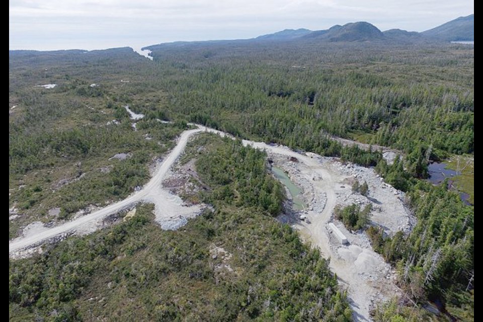 A drone photo of Banks Island Gold's Yellow Giant mine site with Banks Creek in the background. Salmon are currently migrating through the creek.
