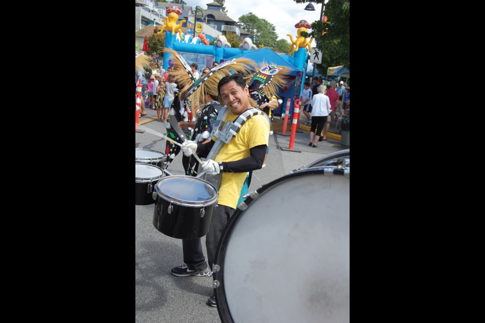 This year’s Sea Cav parade featured hot cars and high-stepping horses, pipers and drummers, veterans and Golden Girls, ethnic dancers and ukulele playing hula girls (and guys). Pictured is Arthur Isidro, a member of Aklanon Santo Nino Association of BC, who was marching with the Sunshine Coast Filipino-Canadian Association. See more photos in our online galleries.