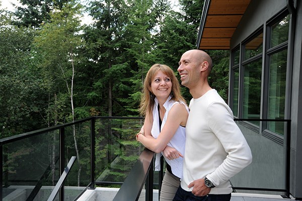 Chantal and Mike Schauch at their new energy-efficient house in Crumpit Woods, Squamish.