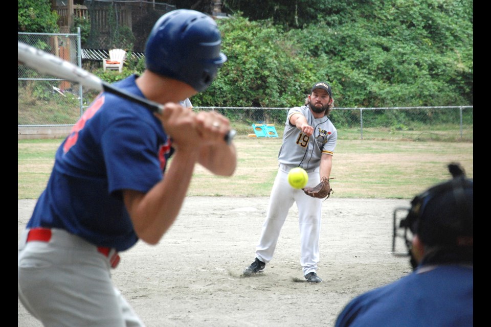 Tyler Jacquet of the Twins keeps an eye on the ball from the Cruisers' Jamie Weismiller.