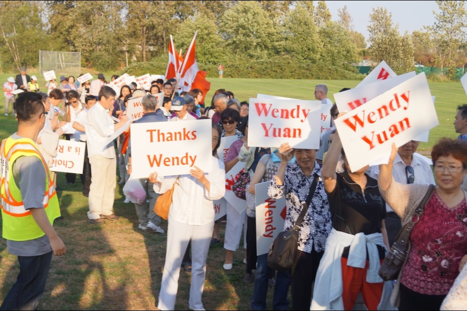 About 150 supporters signed a mock ballot for failed Liberal nominee Wendy Yuan outside Hamilton Community Centre