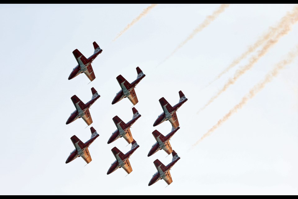 The Snowbirds aerobatic team performs for a crowd of thousands off the Dallas Road waterfront. Aug. 12, 2015