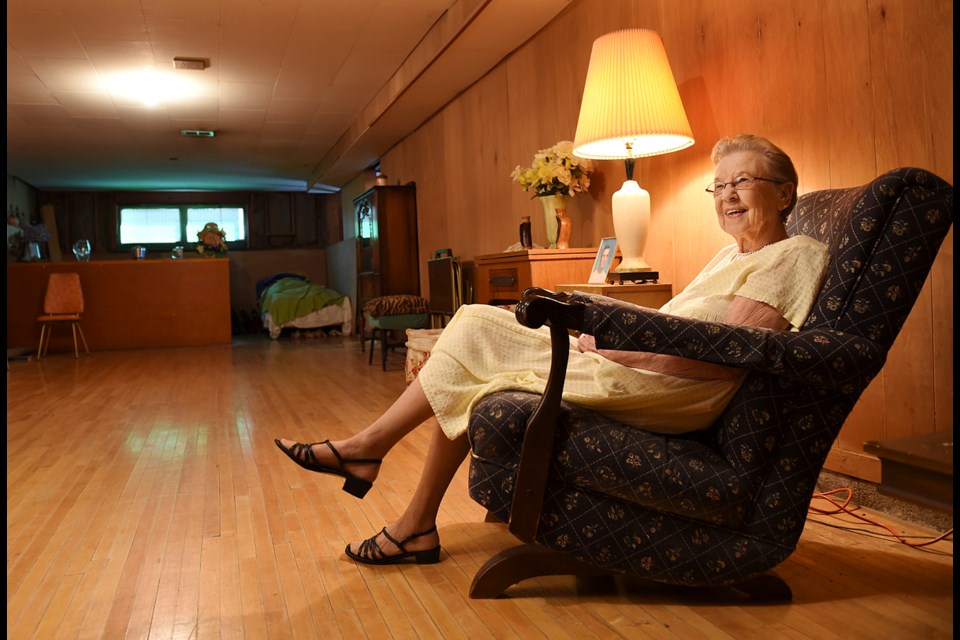 Mildred Henderson, 92, enjoyed many a night at the Danceland Ballroom. Since the downtown venue was demolished in 1965, its floorboards have lined her basement, enjoying another 50 years of dancing. Photo Dan Toulgoet