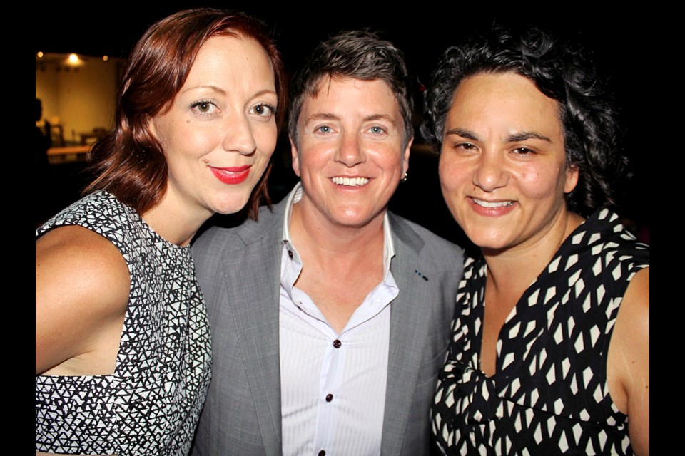Drew Dennis, flanked by associate executive director Metha Brown and programming director Shana Myara, took one last bow after 15 years at the helm as executive director of the Vancouver Queer Film Festival.