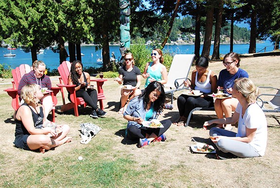 Lush's communication staff from New York, Montreal, Denver, Chicago and Montreal enjoy a vegetarian lunch overlooking Mannion Bay at Bowen Island Lodge.