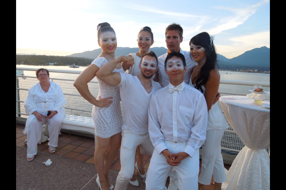 White-clad party goers at Diner en Blanc at Canada Place Aug. 25.