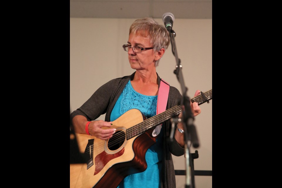 Marge Dyck performs at the Roots Music Festival on Saturday at the Pineview Recreation Centre. The event was hosted by the Peyak Li Moond Metis Society and featured acts such as Kym Gouchie, Country Calibre, and the Other Guys.