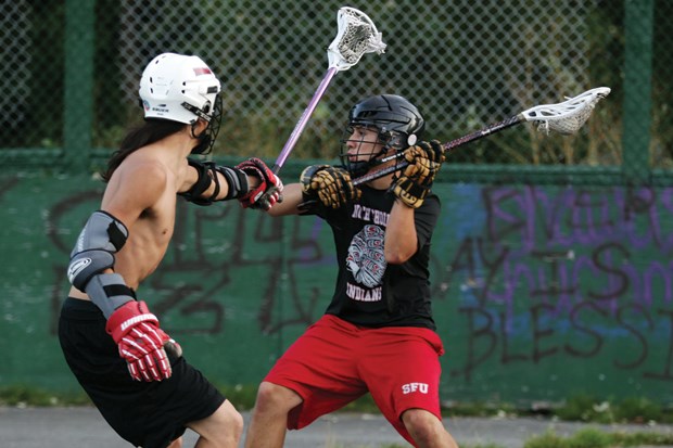 Squamish Nation captain Aidan Baker loads up a shot while a teammate defends during a recent practice at the Nation’s outdoor lacrosse box. The all-star team is preparing for the first ever U19 World Lacrosse Challenge scheduled for Sept. 11-15 by Six Nations in Ontario.