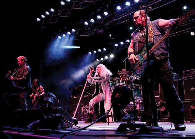 Legendary heavy metal rockers Twisted Sister took over the main stage of the Woofstock Music Festival at Vivian Lake Resort on Saturday.