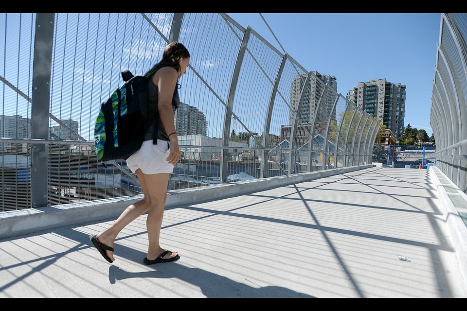 Pedestrians are able to access Westminster Pier Park via a new overpass, but the project's elevator has been delayed.