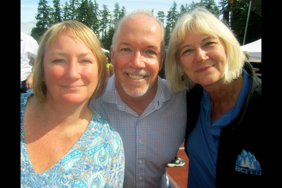 From left: Vancouver and Labour District Council president Joey Hartman, NDP provincial leader John Horgan and B.C. Labour Federation president Irene Lanzinger hosted Metro Vancouver’s largest Labour Day celebrations at Swangard Stadium.