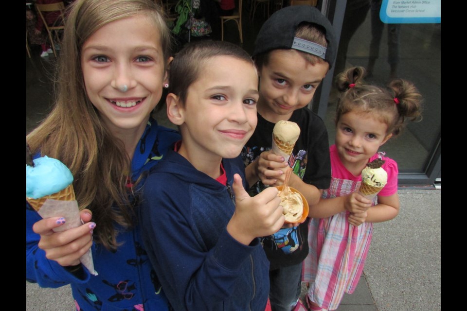 Jadyn Friio, Noah Friio, Jack Glen and Olive Glen with their ice cream picks from Tre Galli in River Market.