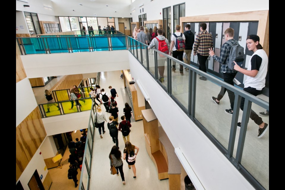 Students fill the hallways of the new Belmont Secondary School.
