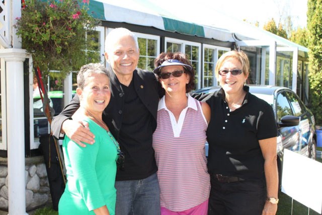 Tee-Cup Tournament co-founders (from right to left) Donna Price and Christine Campbell join former Touchstone Family Association executive director Michael McCoy and Georgina Patko from Pathways Clubhouse at a previous golfing fundraiser.