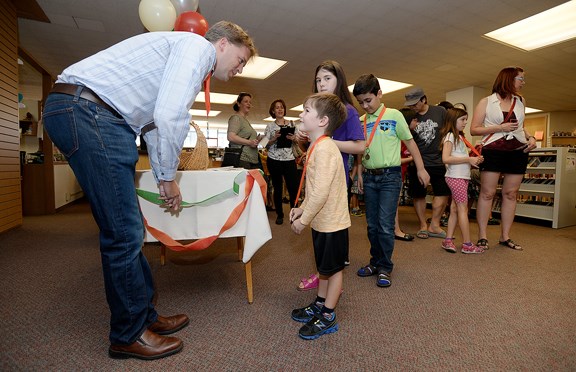 New Westminster Mayor Jonathan Cote congratulates readers at the New Westminster Public Library's annual summer reading club ceremony.