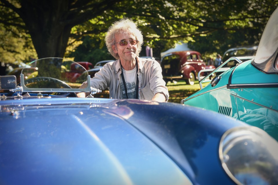 David Ledlin, a Vancouver-based vintage automobile restorer, with the Berkeley B90 he recovered from scratch for a client. The car, sans engine, had been sitting in a field in Surrey, B.C. since the 1980s. The Berkeley was part of a group of microcars that joined in the fun of the Luxury & Supercar Weekend at Van Dusen Botanical Garden. Photograph by: Rebecca Blissett