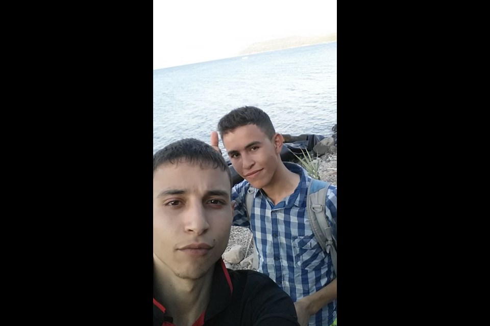 From left, Mohammed Alsaleh's two younger brothers, Majd, 21, and Mahmod, 15, on the trek through Europe. The two, along with four cousins, just reached Germany and are now safe.