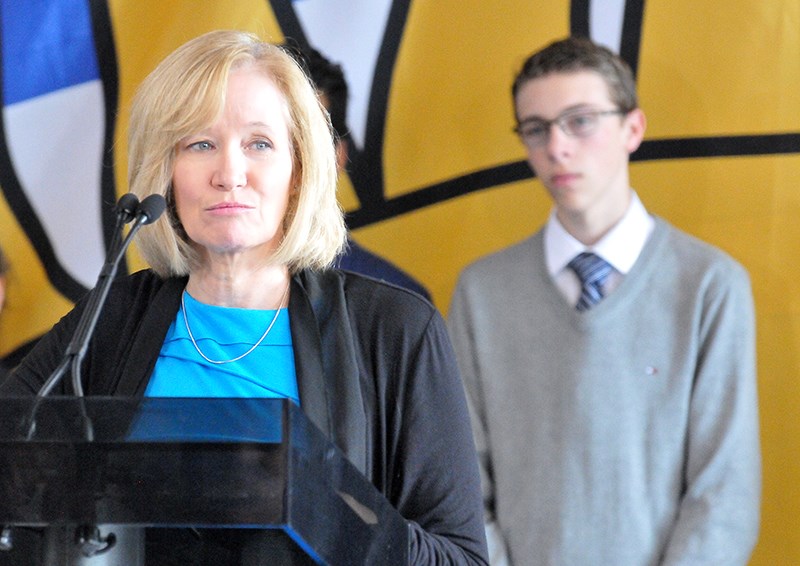 Laureen Harper, the wife of Conservative Prime Minister Stephen Harper, was in Port Moody Sunday to announce, with MP James Moore, that a re-elected Tory government would match donations made this year to the Terry Fox Foundation in honour of his 35th annual run.