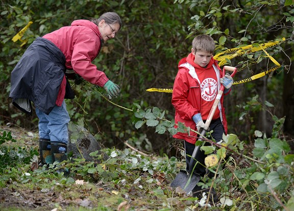 Kathy Siedlaczek and Elliot Roy volunteer in the Great Canadian Shoreline Cleanup in Queensborough.